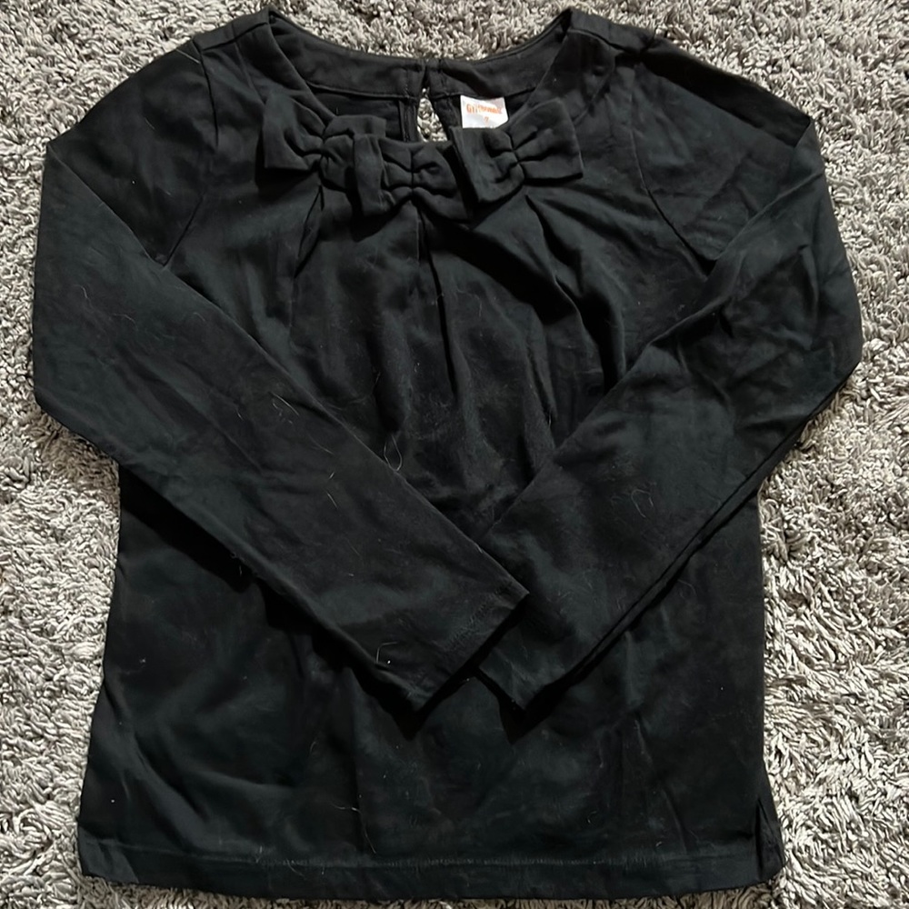 Gymboree black long sleeve tee with three bows at neck. Size 7